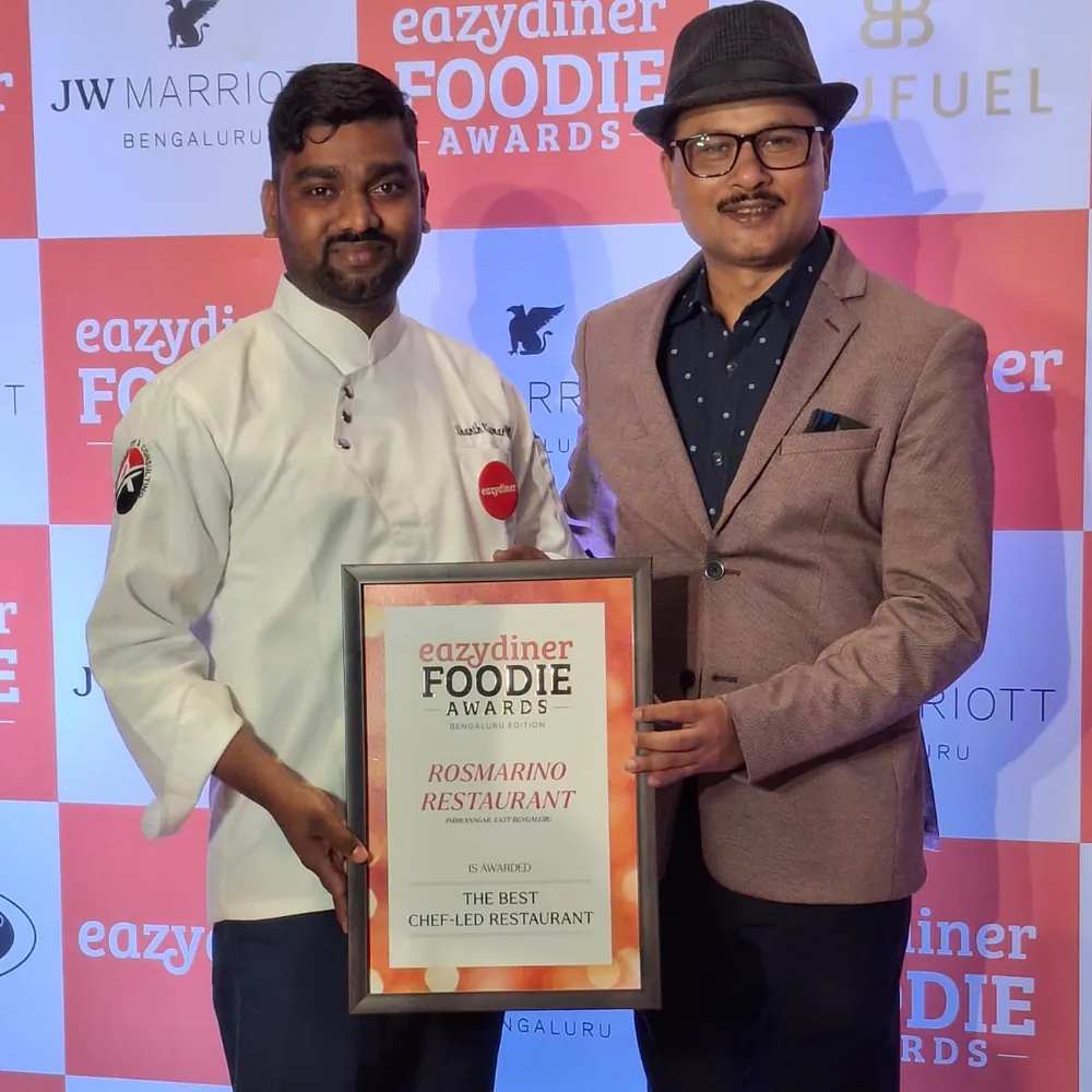 The Rosmarino team receiving the Best Chef-Led Restaurant award at the EazyDiner Foodie Awards, Bengaluru edition.