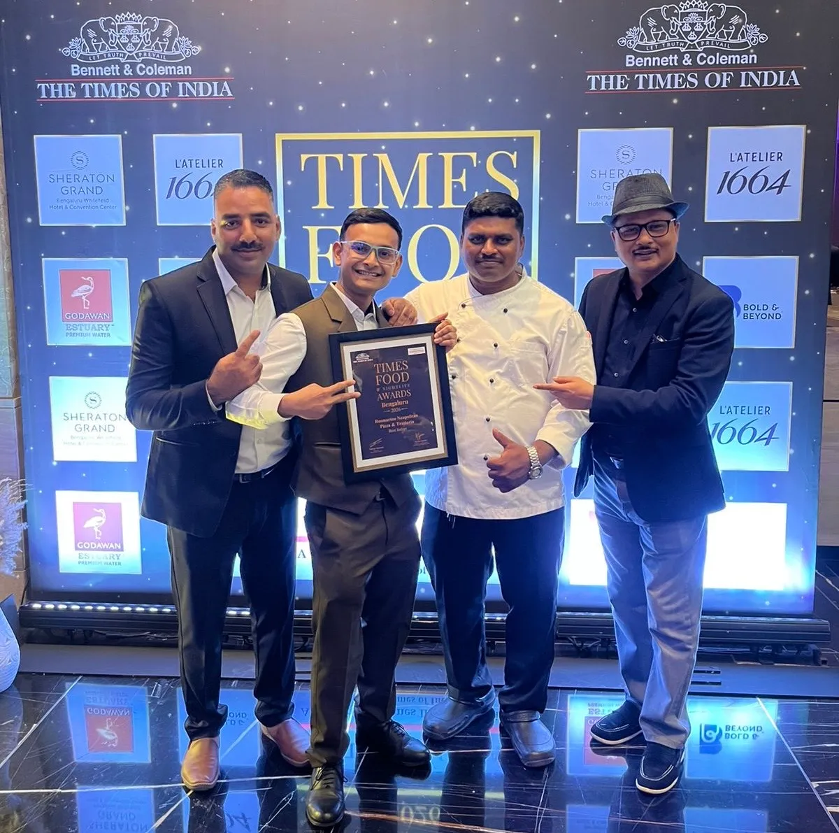 Chef Abhijit Saha and the Rosmarino team receiving the Best Italian Restaurant award at Times Food & Nightlife Awards, Bengaluru 2026