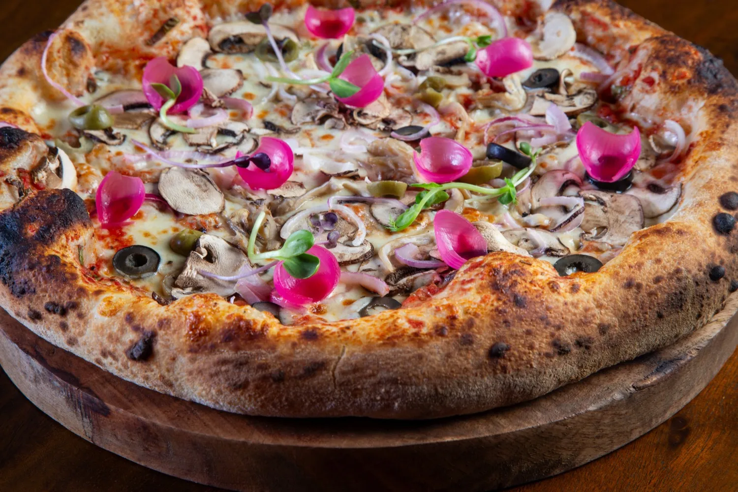 Wood-fired Fungi Misti pizza — mushrooms, olives and pickled onion — at Rosmarino, Indiranagar