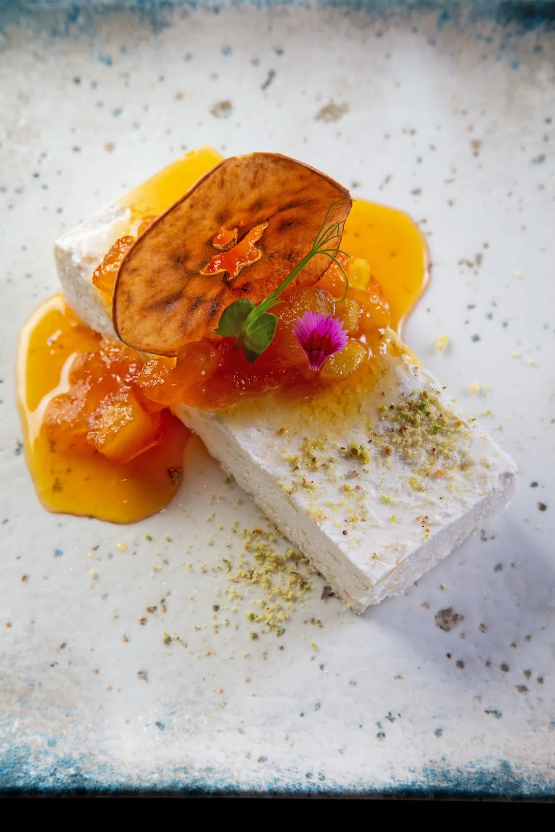 Roasted almond and vanilla semifreddo with quince at Rosmarino, Indiranagar