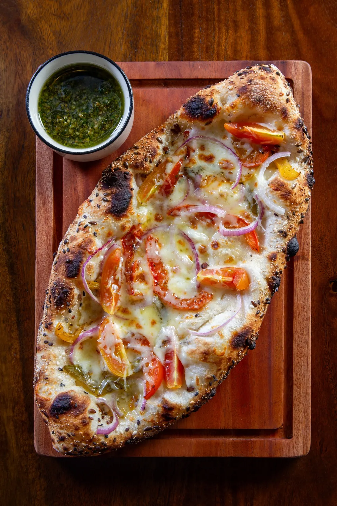 Wood-fired garlic bread flatbread with pesto at Rosmarino, Indiranagar
